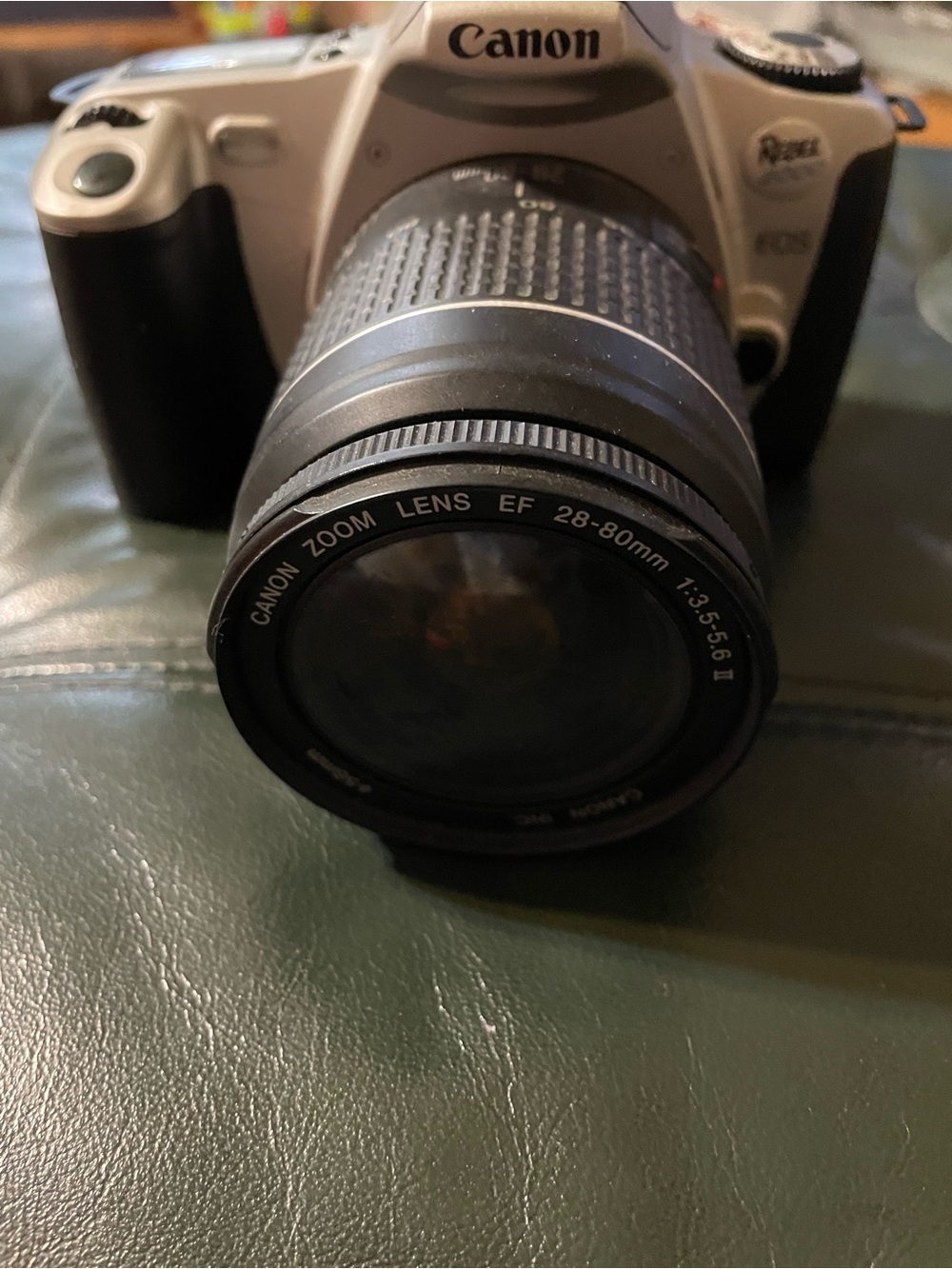 Canon Silver and Black DSLR with Canon Zoom Lens EF 28-80mm